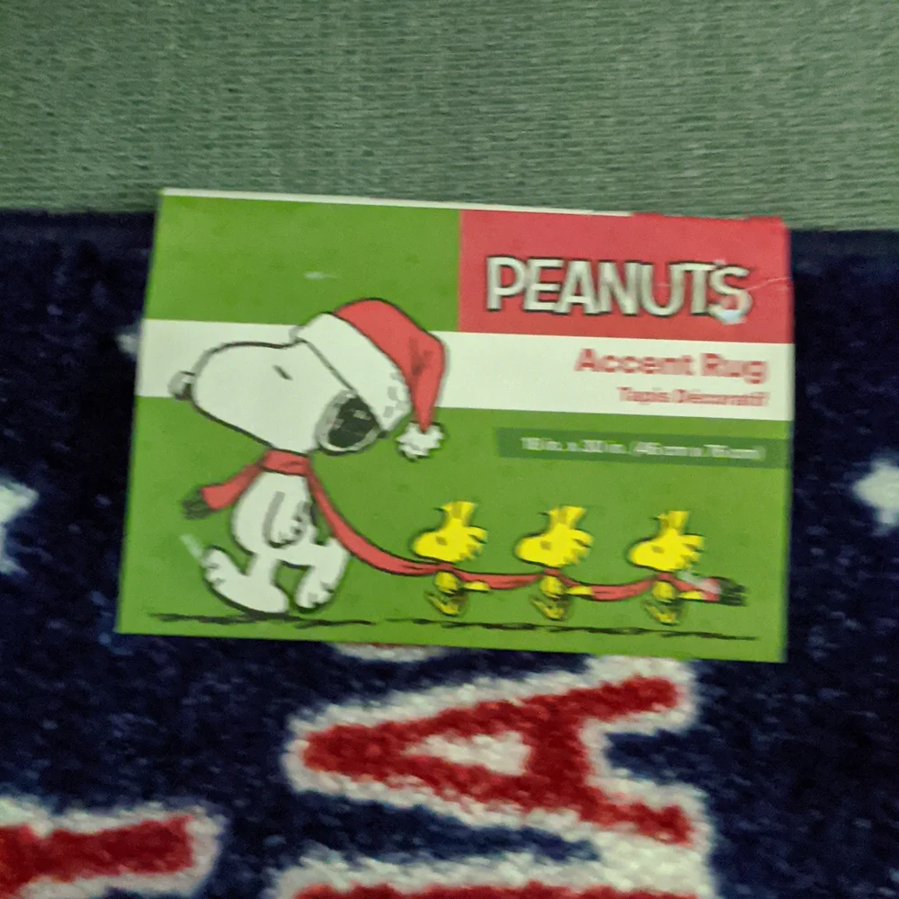 Peanuts Christmas theme accent rug